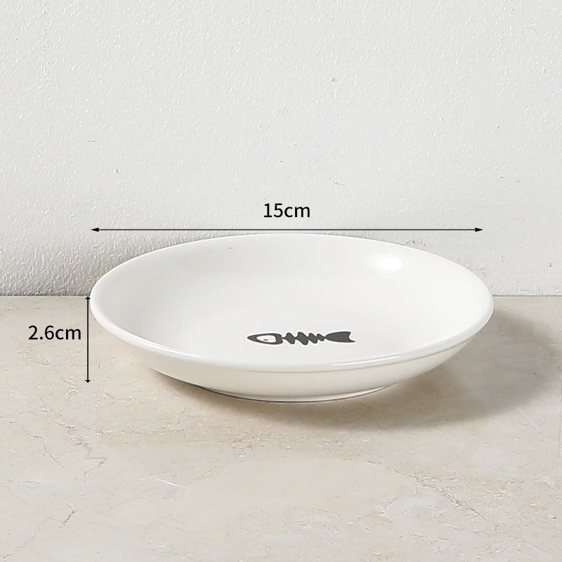 White ceramic bowl with measurements on a light surface