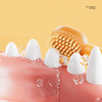 Dental cleaning brush with teeth and water droplets on a yellow background